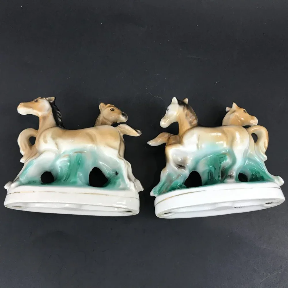 Two small antique horse figurines marked occupied Japan